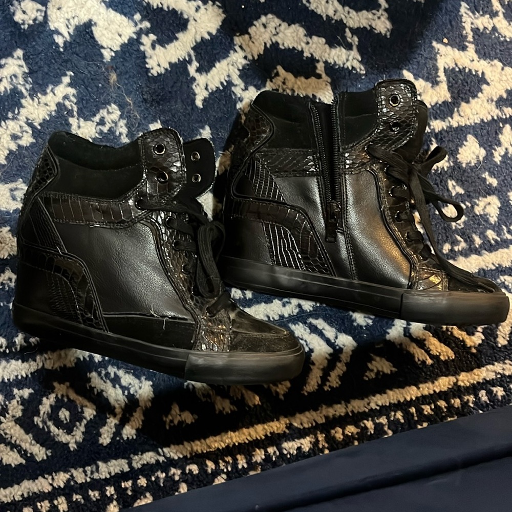 Black high top sneakers